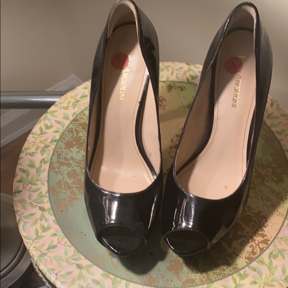 Black patent leather peep toe shoes